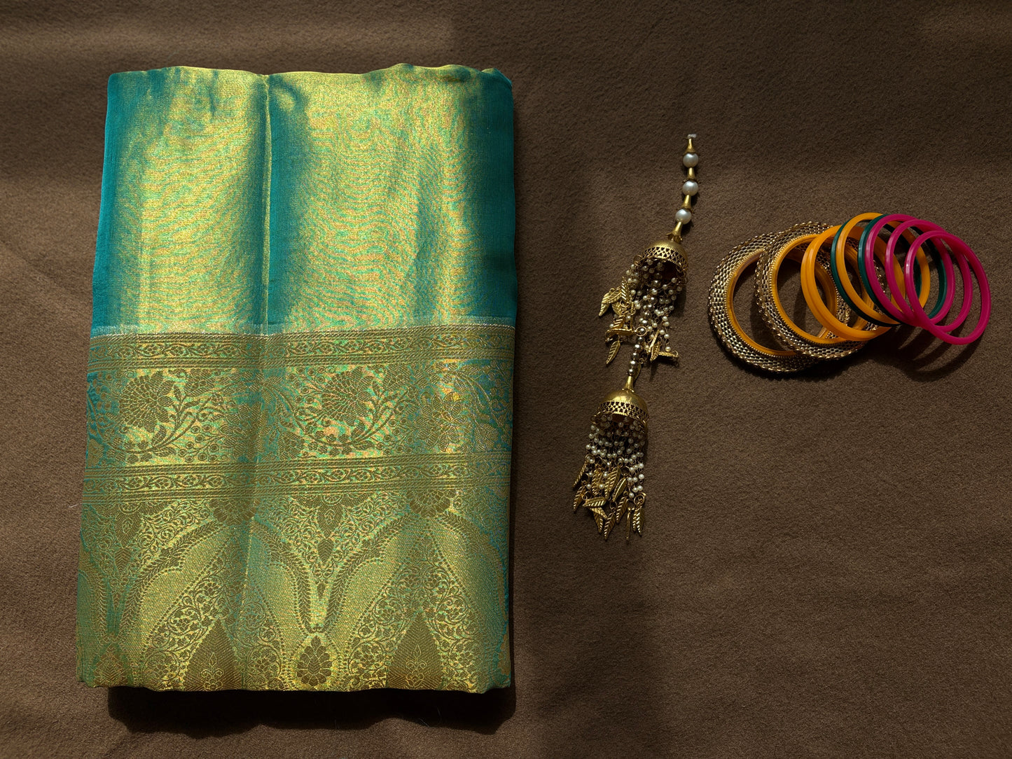 Teal Green Tissue Silk Saree